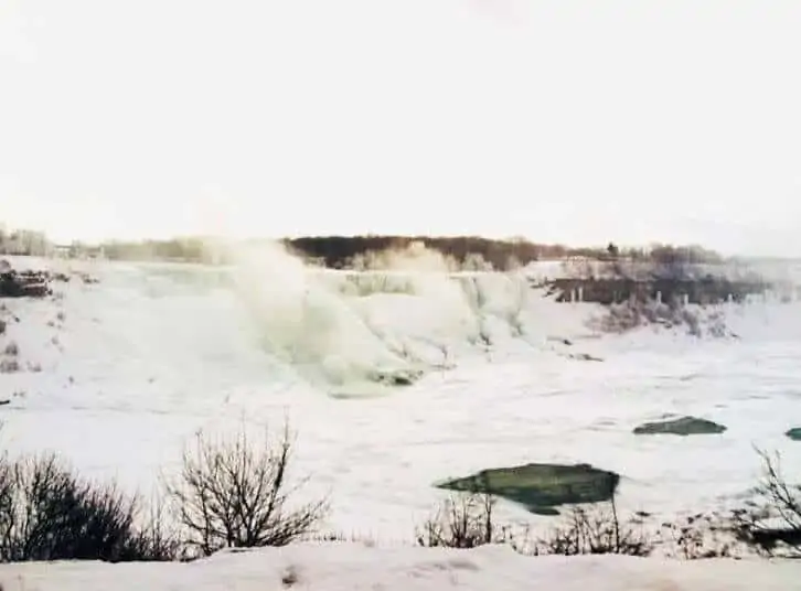 winter in niagara falls frozen waterfall.