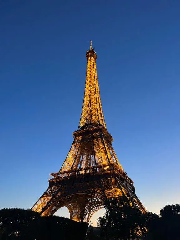 family trip to paris eiffel tower dusk